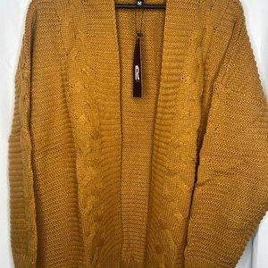 Women's Soft Knit Camel Cardigans with Chunky Sleeves and an Open Front.